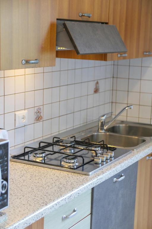 Kuchyňa alebo kuchynka v ubytovaní Appartamento l'edera