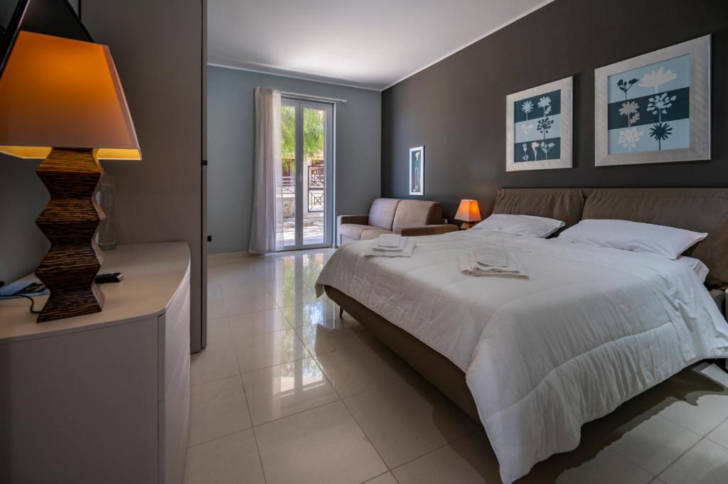 Posteľ alebo postele v izbe v ubytovaní Villa Floyd Charming Rooms B&B