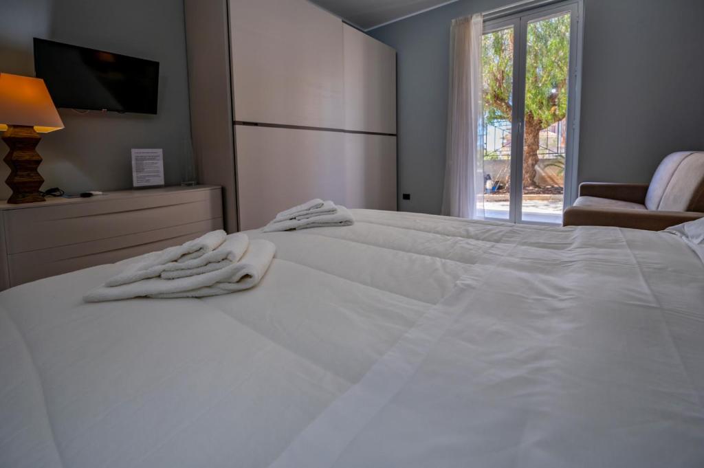 Posteľ alebo postele v izbe v ubytovaní Villa Floyd Charming Rooms B&B