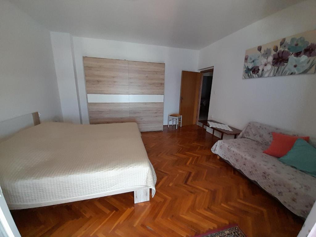 Postel nebo postele na pokoji v ubytování Apartments and Studios Vinko Matić