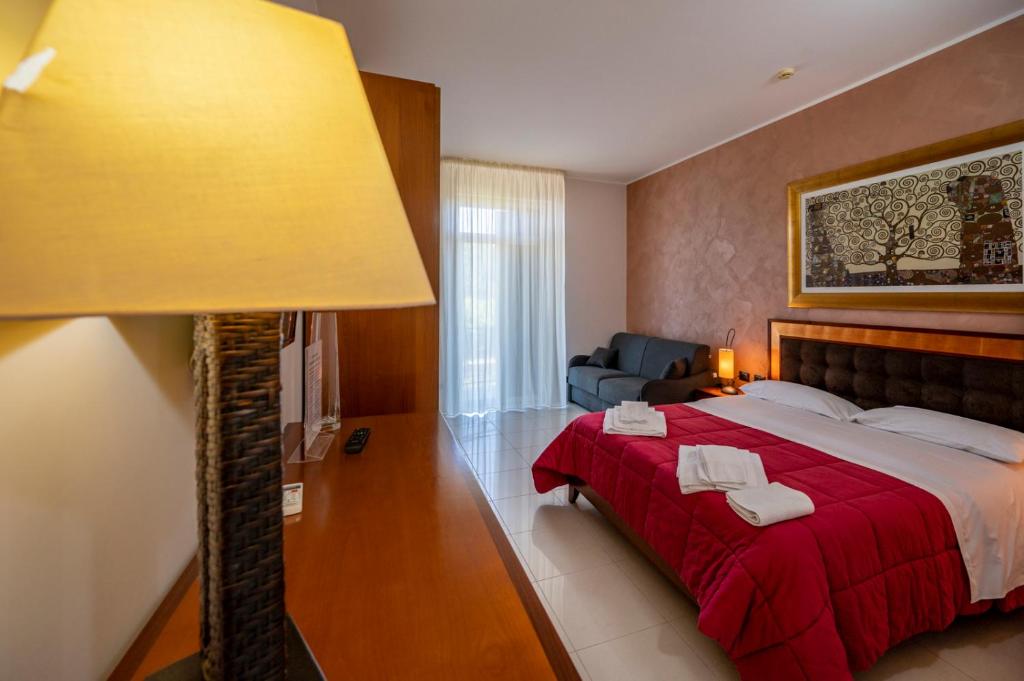 Posteľ alebo postele v izbe v ubytovaní Villa Floyd Charming Rooms B&B