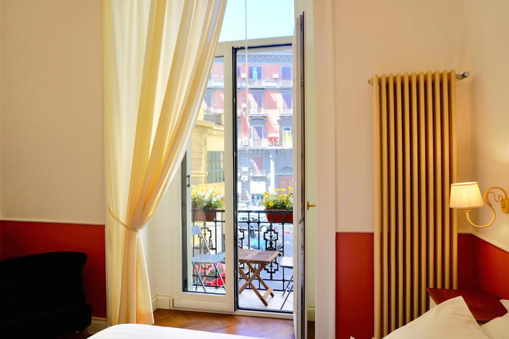 Krevet ili kreveti u jedinici u objektu Macchiato Suites Boutique Guest House