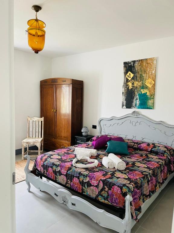 Łóżko lub łóżka w pokoju w obiekcie Appartamenti Podere San Sebastiano
