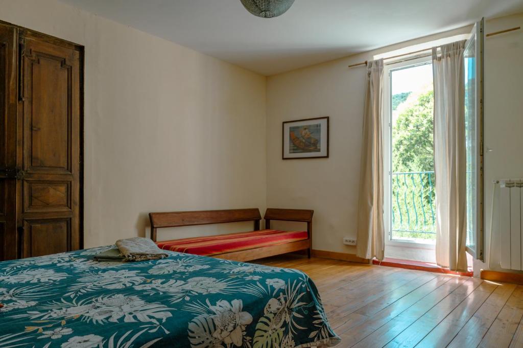 Postel nebo postele na pokoji v ubytování Gites de la Soulondre