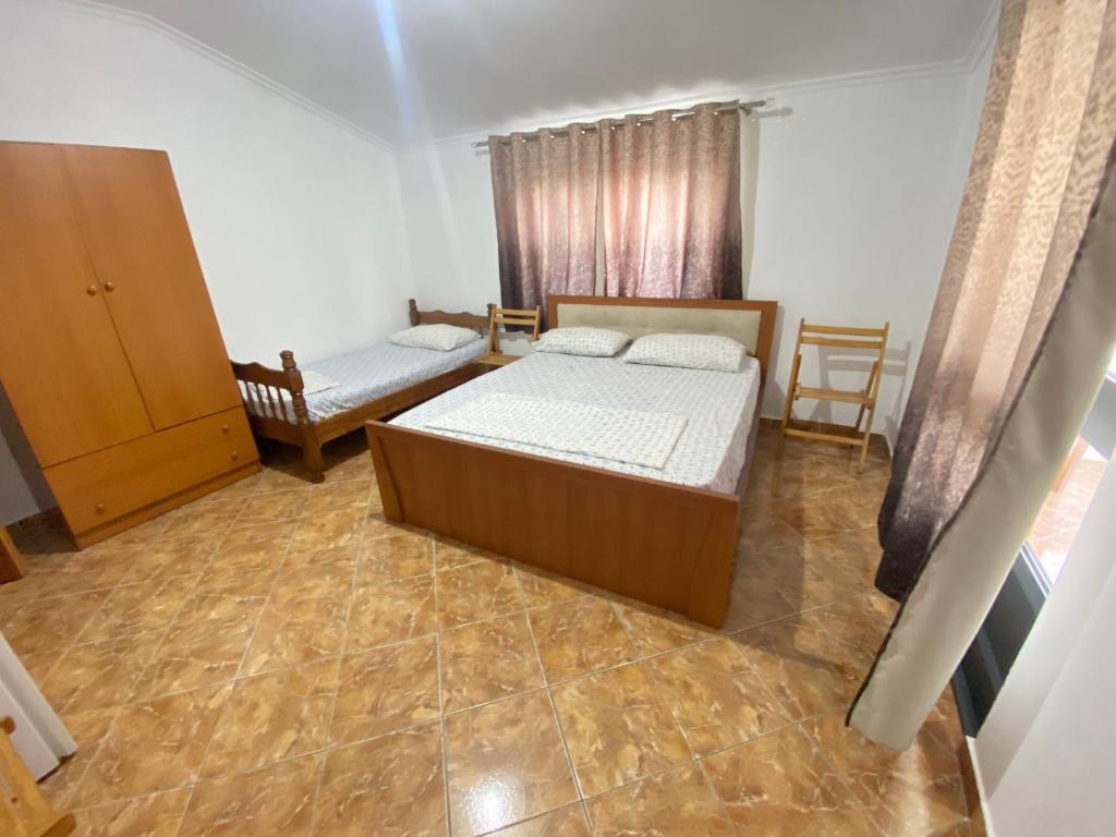 Postel nebo postele na pokoji v ubytování Villa Osmani