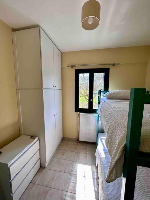 Postel nebo postele na pokoji v ubytování Κυδωνιά Μάνη