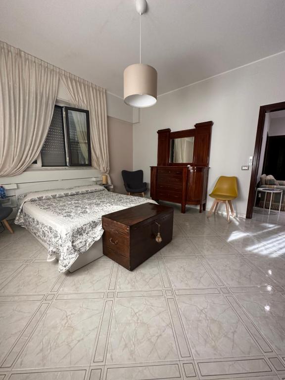 Posteľ alebo postele v izbe v ubytovaní Casa di Nonna Mariella