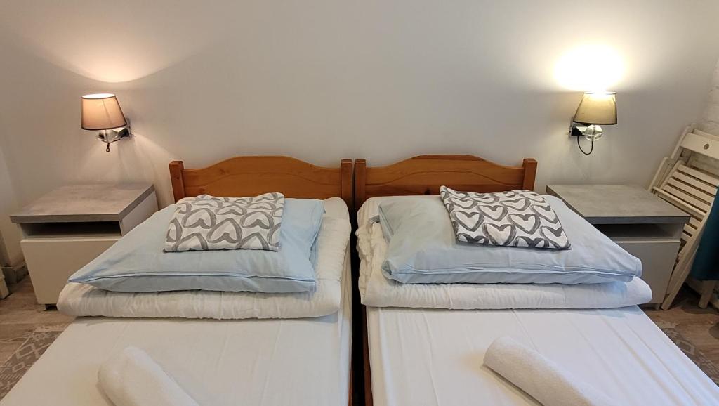 Postel nebo postele na pokoji v ubytování Chmielna 5 Rooms & Apartments