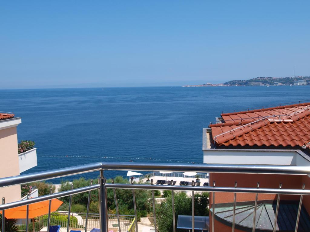 a view of the water from a building at VILLA AURORA YourCroatiaHoliday in Savudrija