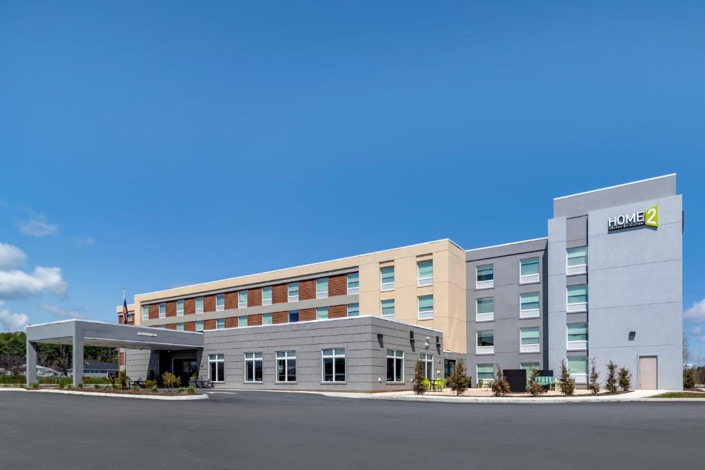 a rendering of the front of a building at Home2 Suites by Hilton Bangor in Bangor