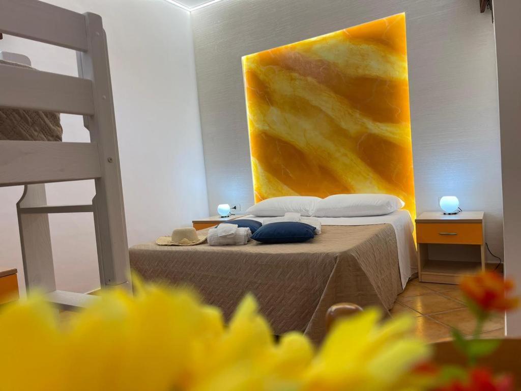 Postel nebo postele na pokoji v ubytování "L'Oasi di Favignana" Room and Charme