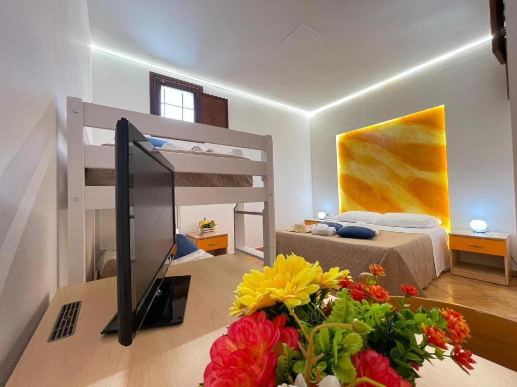 Postel nebo postele na pokoji v ubytování "L'Oasi di Favignana" Room and Charme