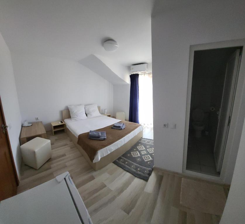 Un pat sau paturi într-o cameră la Casa SoRal
