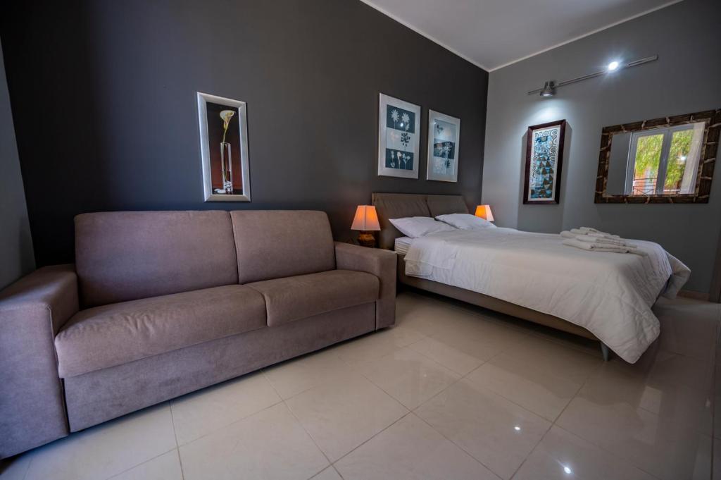 Posteľ alebo postele v izbe v ubytovaní Villa Floyd Charming Rooms B&B
