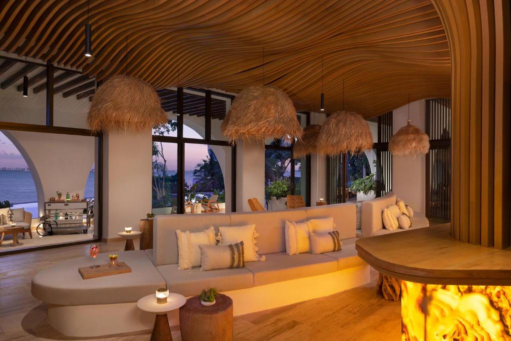 Гостиная зона в Impression Isla Mujeres by Secrets - Adults Only - All Inclusive
