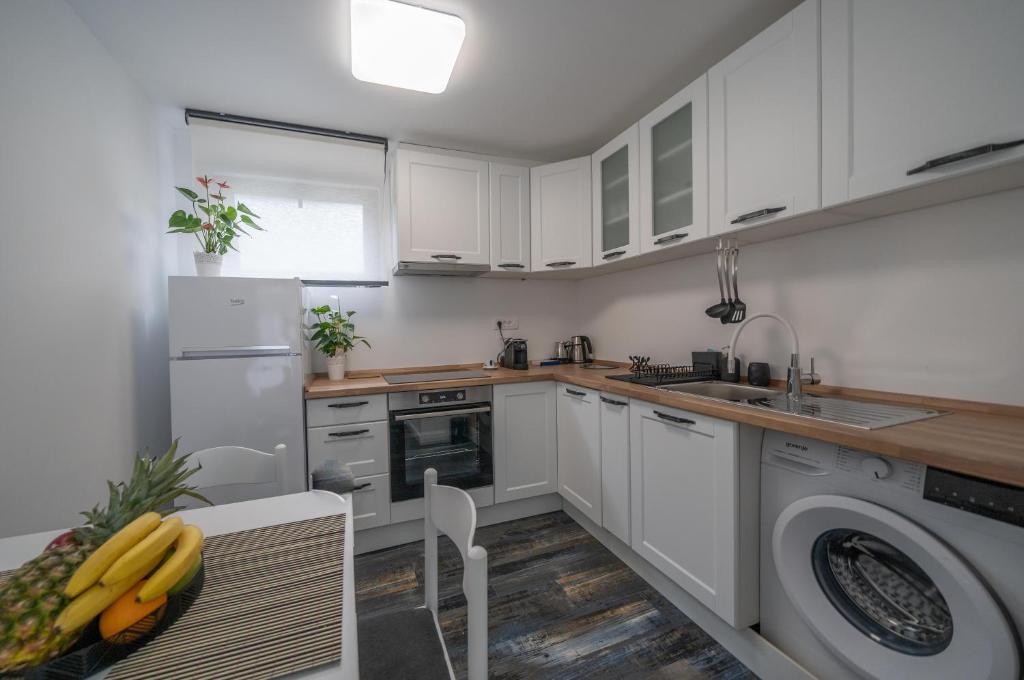 A cozinha ou kitchenette de Zoi apartment