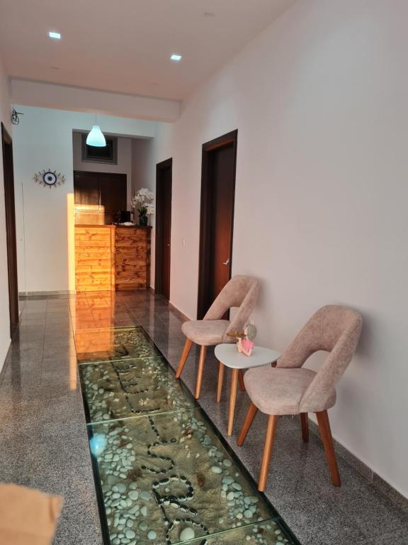 Posezení v ubytování Nefelis Rooms