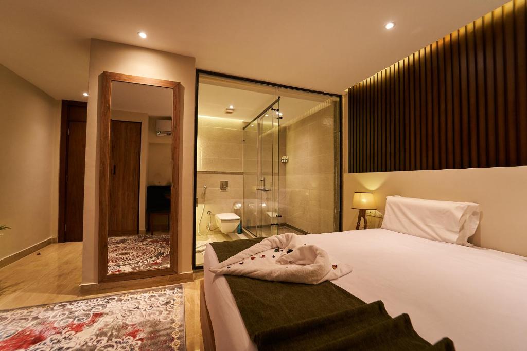 Letto o letti in una camera di New Pyramid Front Hotel