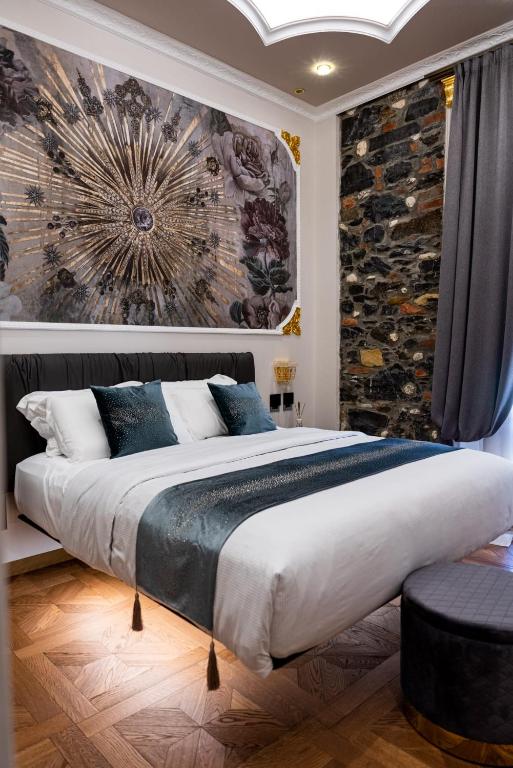 Postel nebo postele na pokoji v ubytování Queen Cattleya Suite