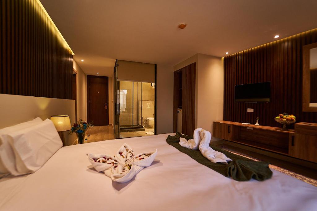 Letto o letti in una camera di New Pyramid Front Hotel