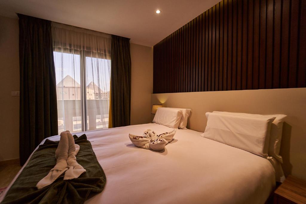 Letto o letti in una camera di New Pyramid Front Hotel