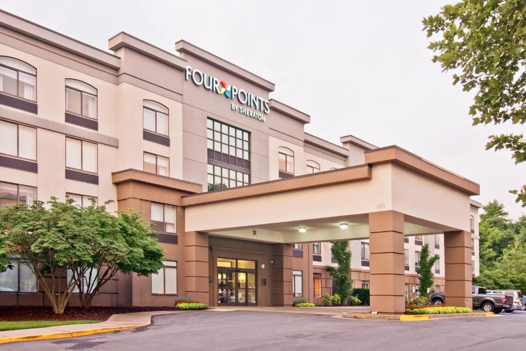 a rendering of the front of a four seasons hotel at Four Points by Sheraton Nashville Airport in Nashville