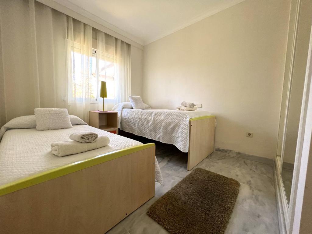 Posteľ alebo postele v izbe v ubytovaní Precioso Apartamento Puerto Banus Marbella