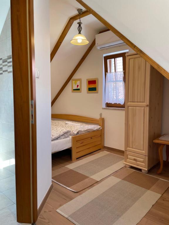 Letto o letti in una camera di Kis-Duna Vendégház