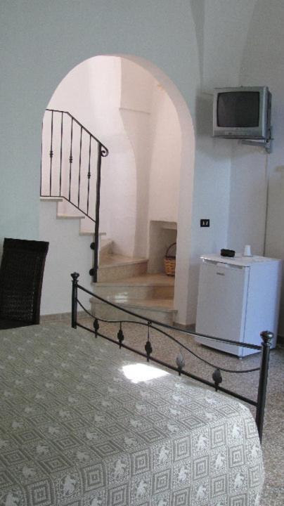 Postel nebo postele na pokoji v ubytování B&B Camera A Sud Tuglie Gallipoli