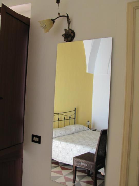 Postel nebo postele na pokoji v ubytování B&B Camera A Sud Tuglie Gallipoli