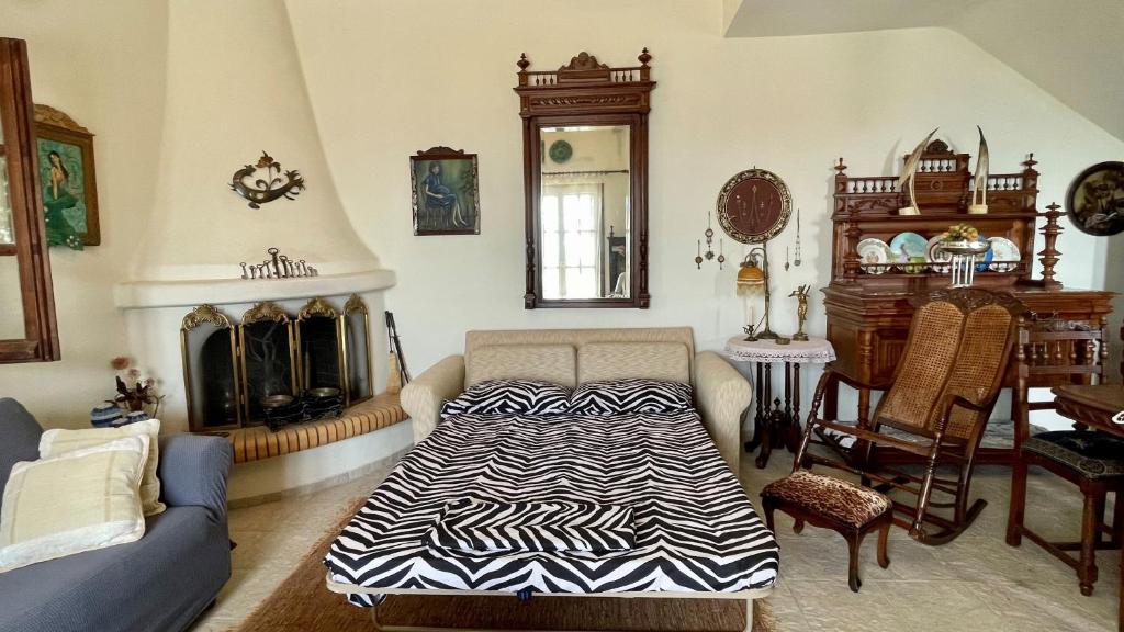 Postel nebo postele na pokoji v ubytování Iris Sea View Villa