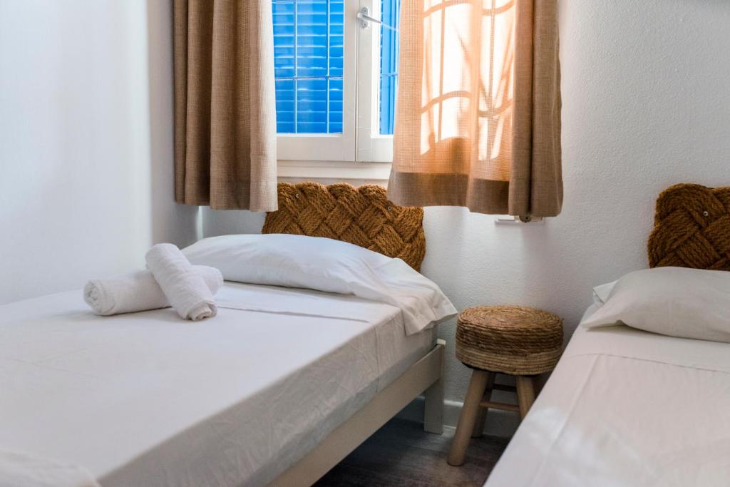 Postel nebo postele na pokoji v ubytování Apartamentos Verdera Es Pujols