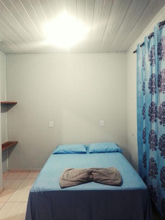 Postel nebo postele na pokoji v ubytování Hotel Pousada e Parada Colonial