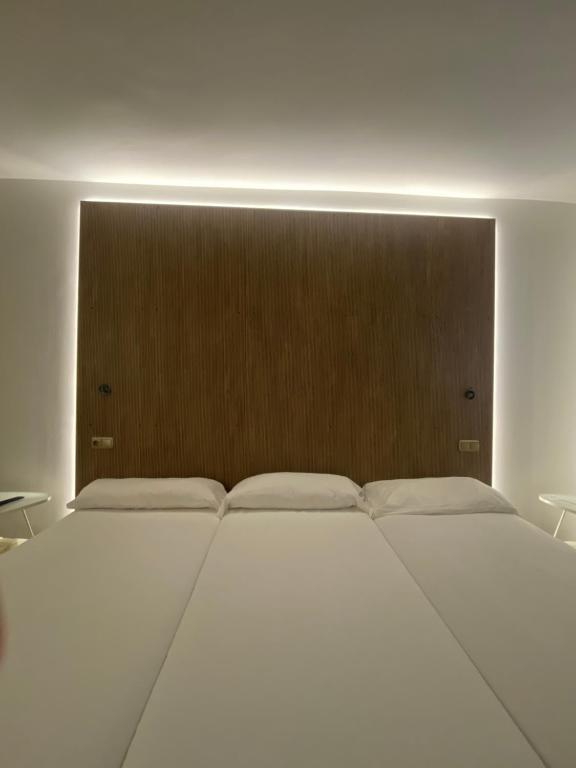 Postel nebo postele na pokoji v ubytování Hotel Villasegura