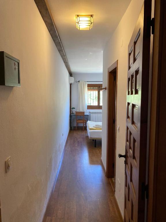 Postel nebo postele na pokoji v ubytování La Ventera - summer hotel