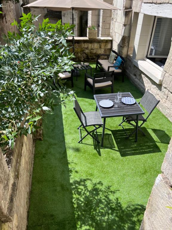 Zahrada ubytování Le Badebec, Appt dans maison typique avec jardin privé