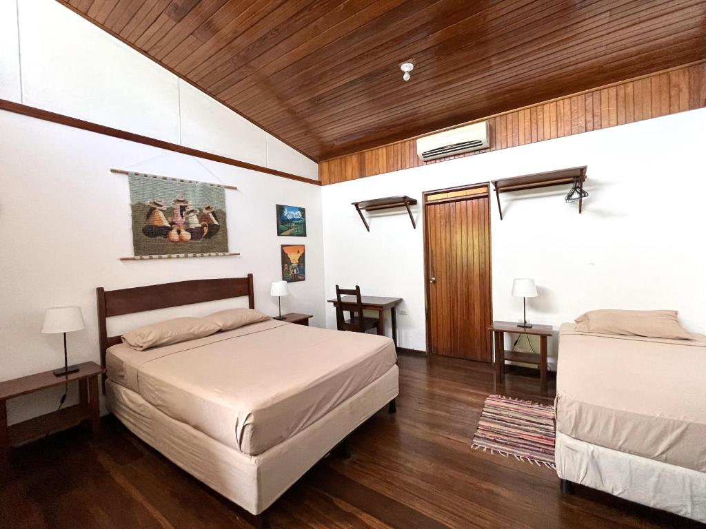 Posteľ alebo postele v izbe v ubytovaní El Clan Hostel