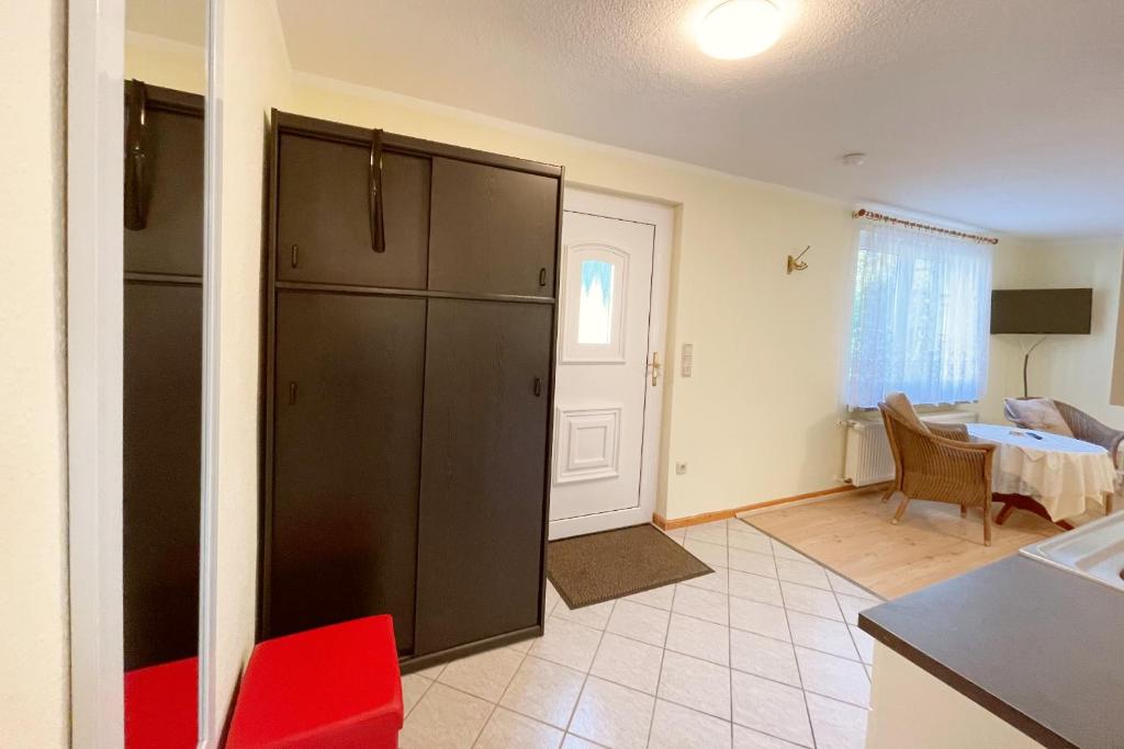 Postel nebo postele na pokoji v ubytování Bungalow Bergstrasse 3 Ferienwohnung 1