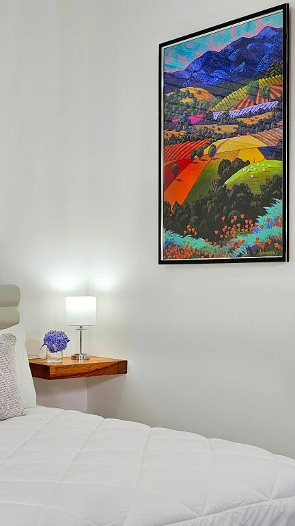 Postel nebo postele na pokoji v ubytování El Cielo by Villa Alejandro