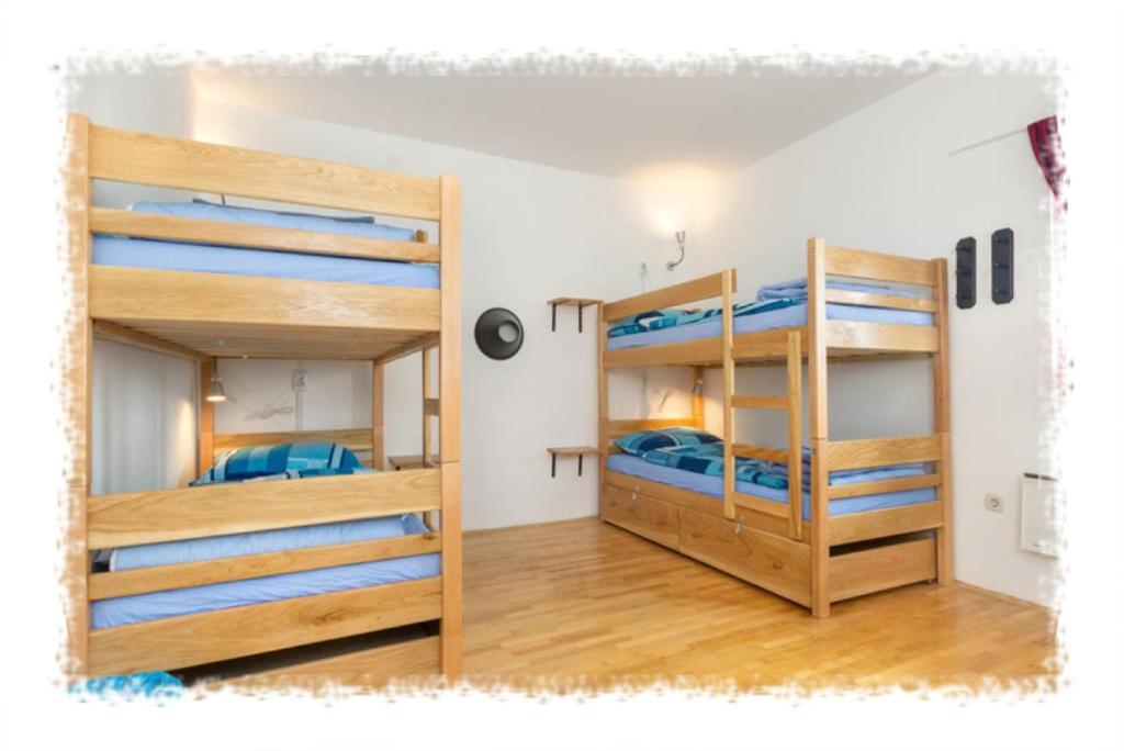 Postel nebo postele na pokoji v ubytování Hostel Oktarin