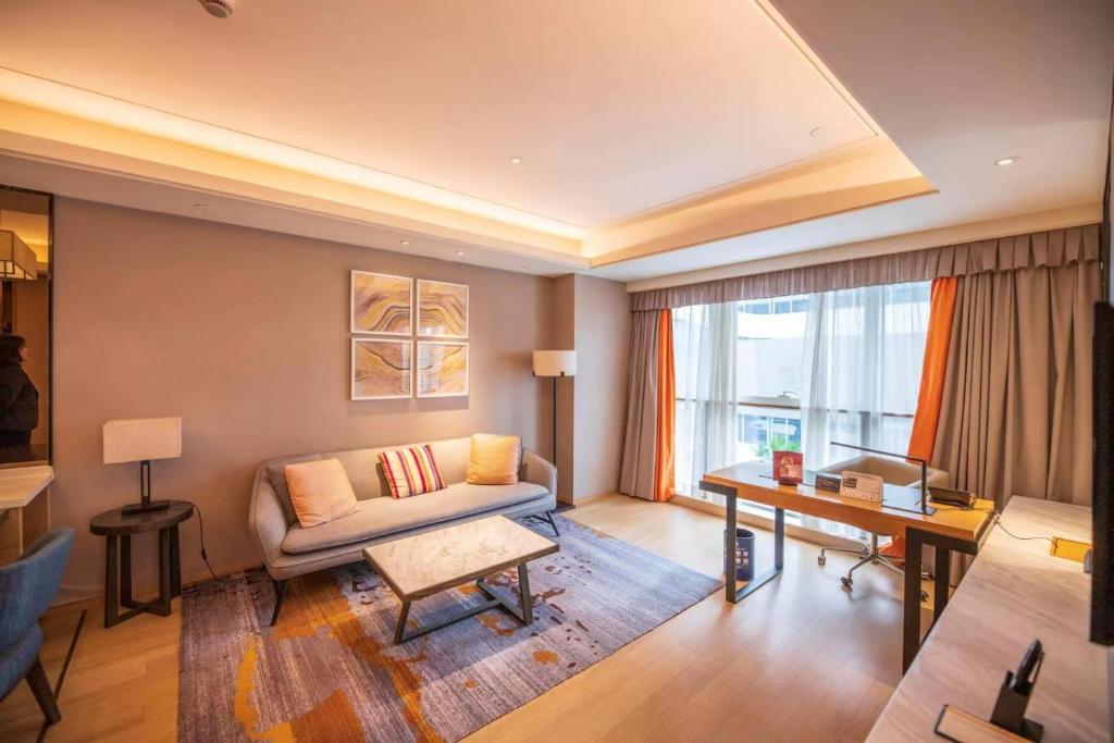 Posezení v ubytování HongQiao Primus Residence Apartment - National Exhibition Center
