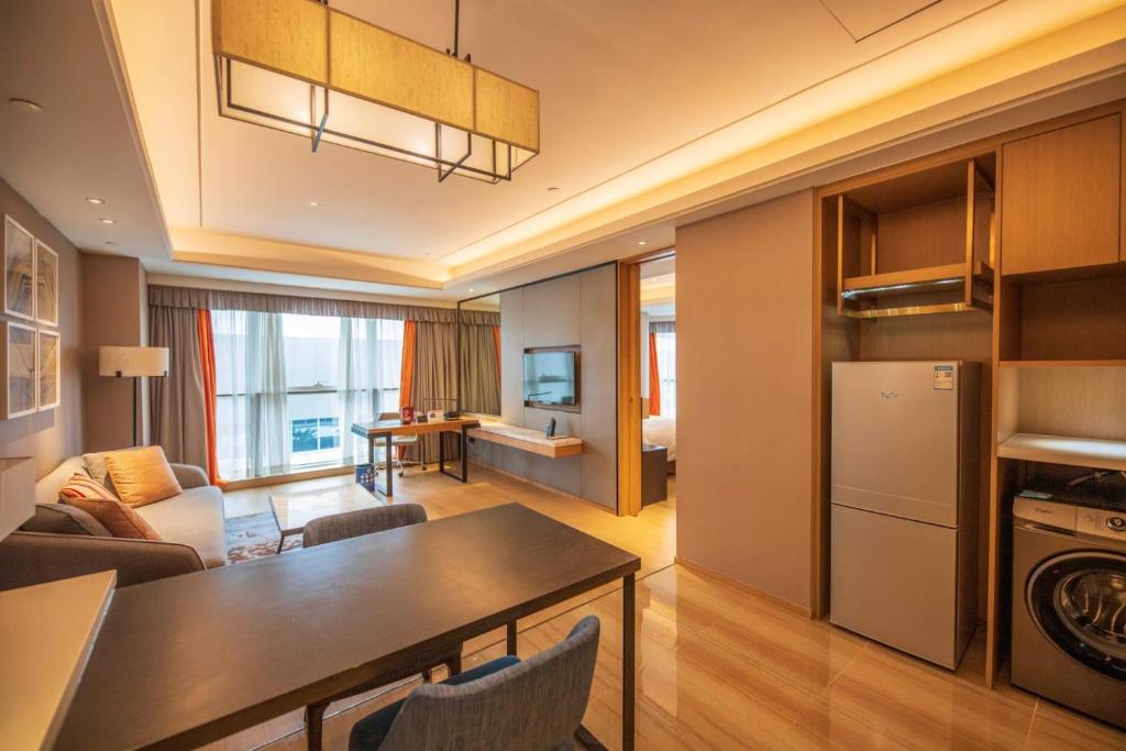 Kuchyň nebo kuchyňský kout v ubytování HongQiao Primus Residence Apartment - National Exhibition Center