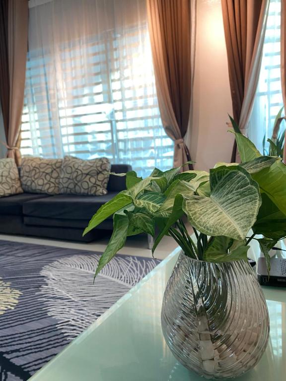 Posezení v ubytování Homestay Aalaiya Bertam Kepala Batas - Fully Aircond
