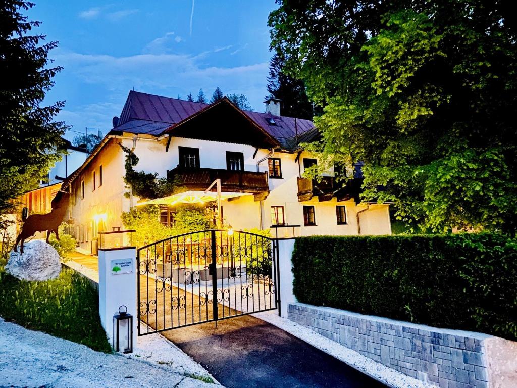 a house with a gate in front of it at Mariazeller Resort Landliebe in Mariazell