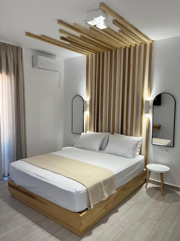 Posteľ alebo postele v izbe v ubytovaní Akroyiali Resort