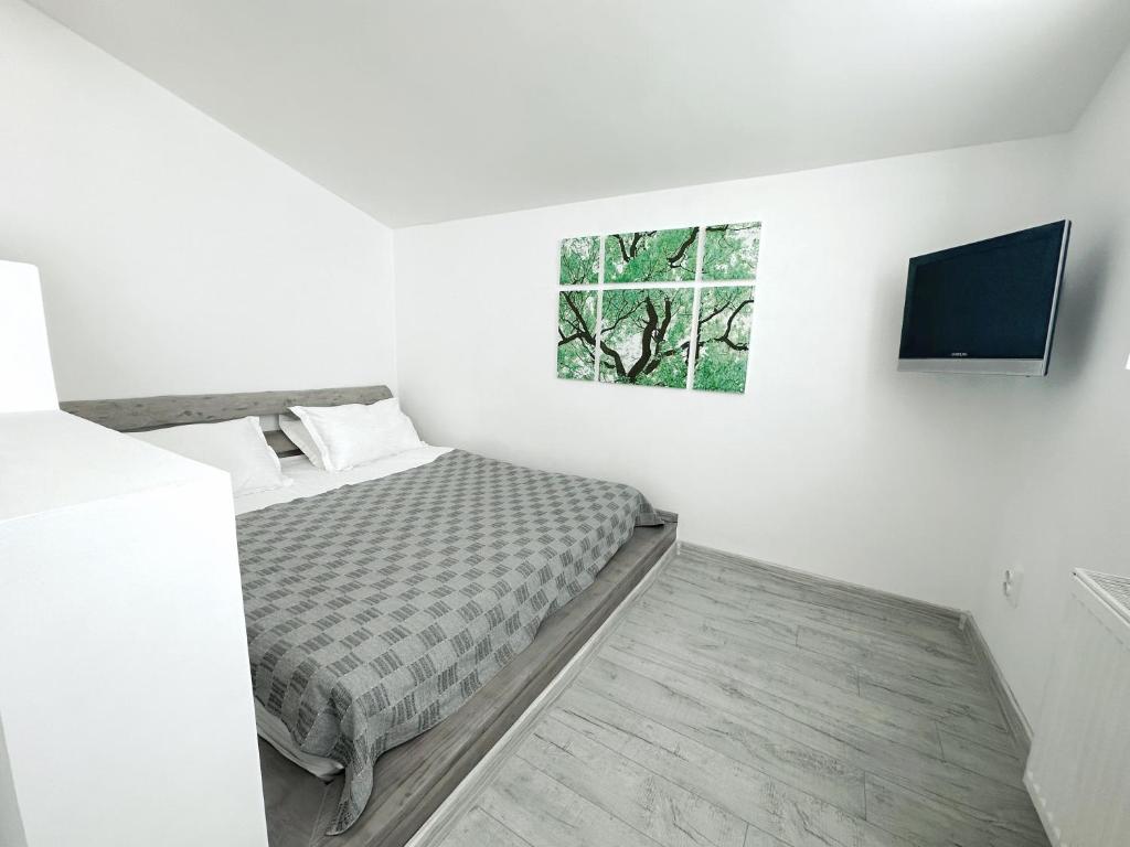 Postel nebo postele na pokoji v ubytování Higina Spa Hotel