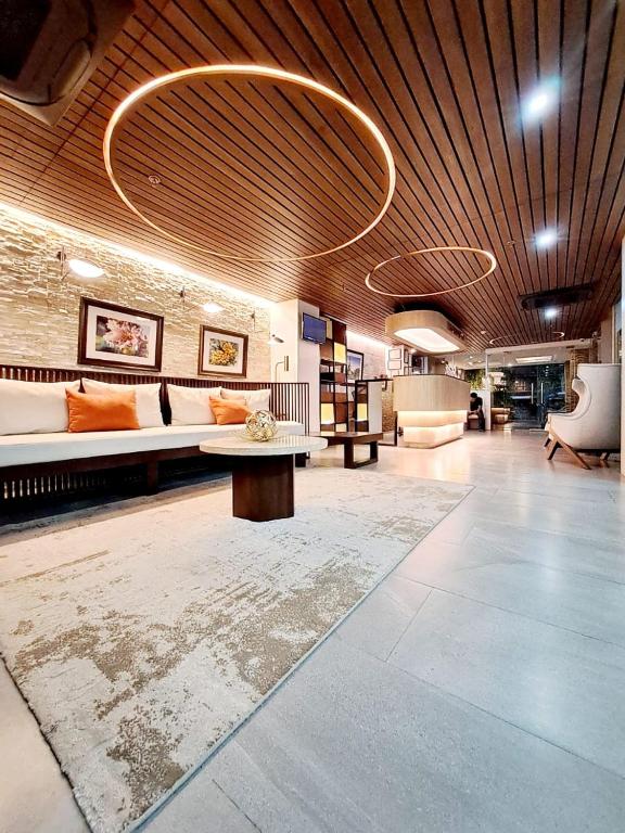 Posezení v ubytování Chambre Hotel Mactan