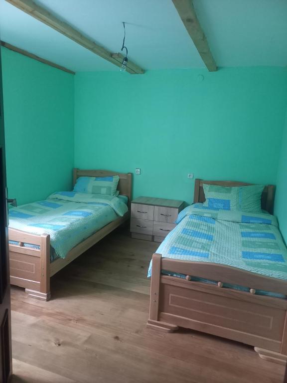 En eller flere senger på et rom på Sesili Guesthouse