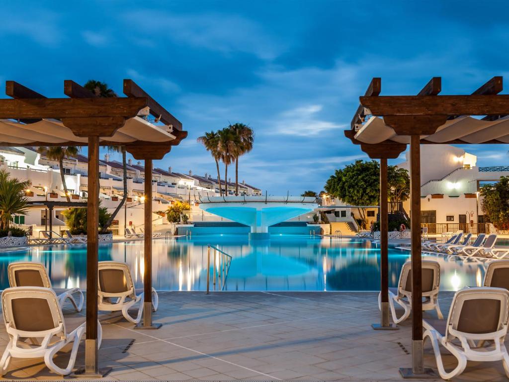 a view of the pool at the resort at BLUE WATERS Apartment with heated pool in Costa Del Silencio