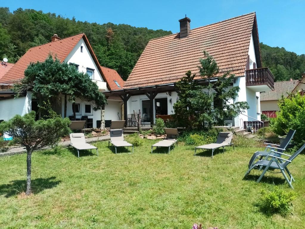 a group of chairs in the yard of a house at Lachberg9 in Dahn